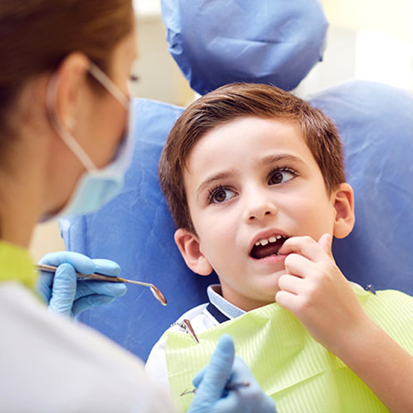 boy and dentist